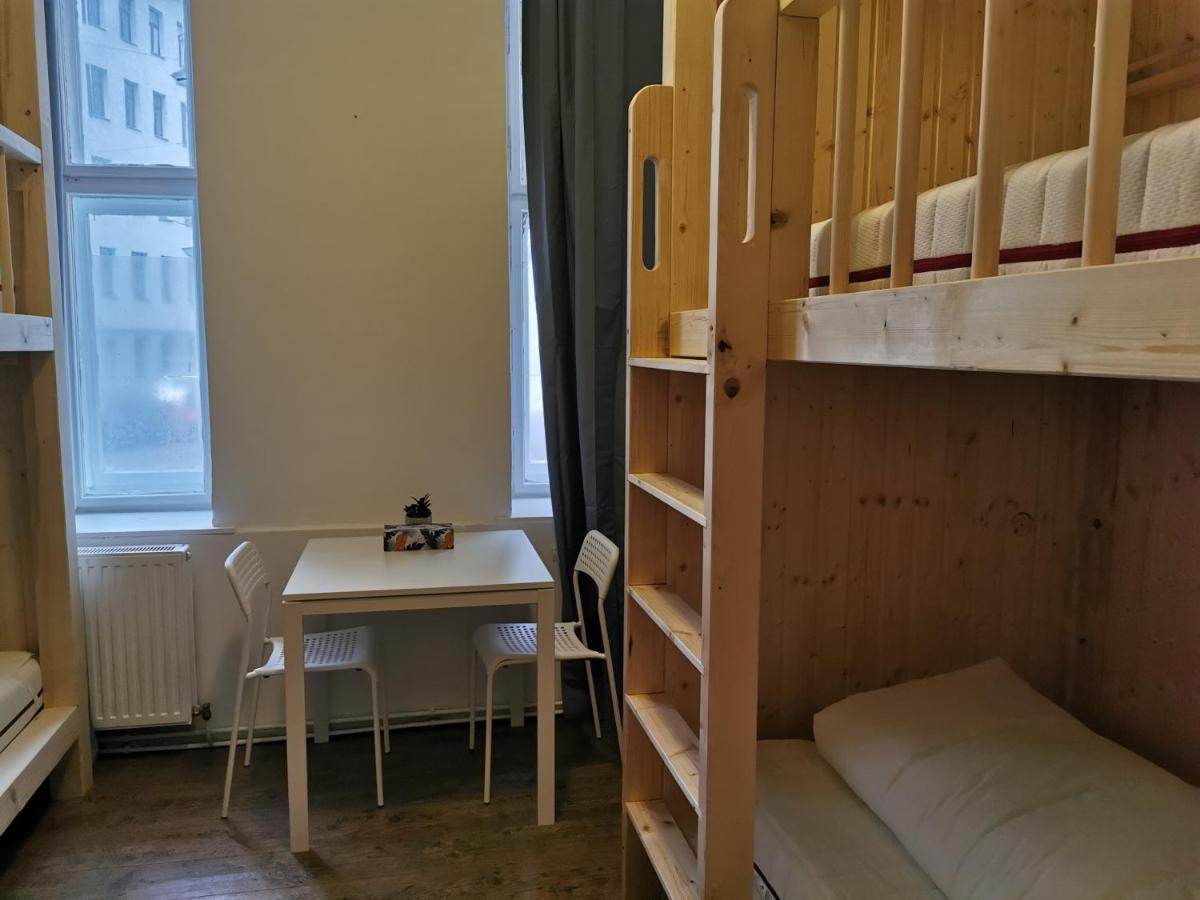Chambre Quadruple avec Salle de Bains Commune