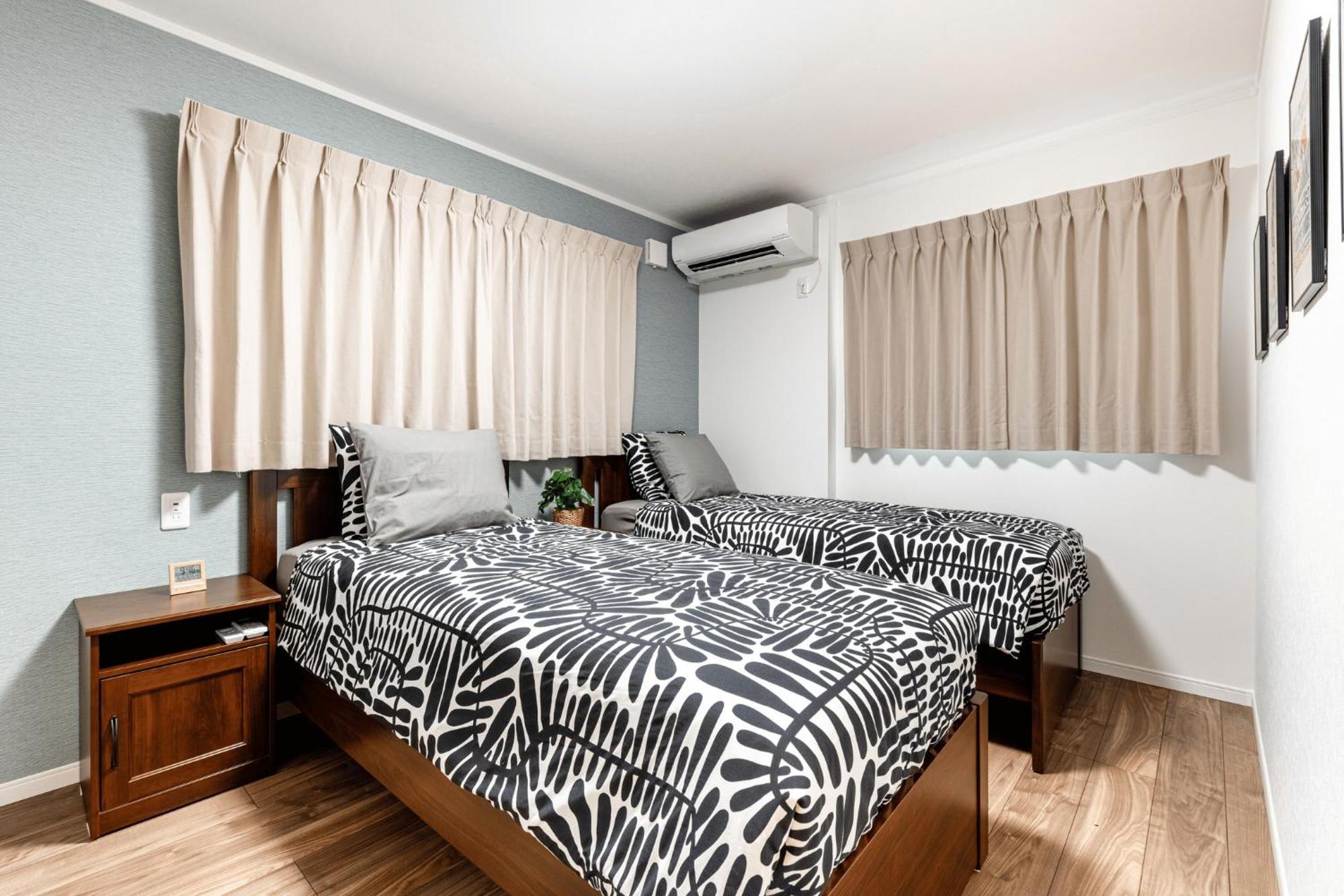 Chambre Lits Jumeaux avec Salle de Bains Privative