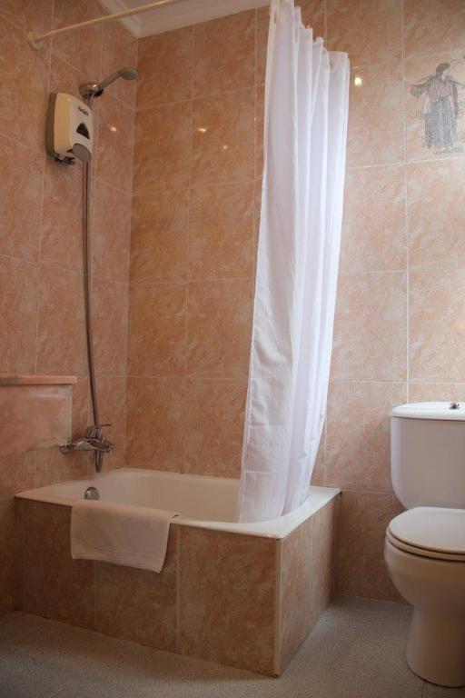 Chambre Quadruple avec Salle de Bains Privative