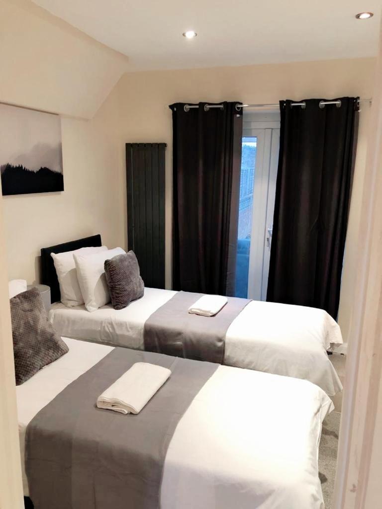 Chambre Double ou Lits Jumeaux Deluxe – Vue sur Jardin