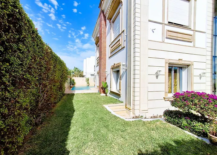 L'Orchidée - Suites de Luxe avec Piscine Chauffée et Vue sur le Lac de Tunis